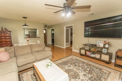 Step into the serene oasis of Myrtle Beach Golf & Yacht, a on Heron Point Golf Club in South Carolina - for sale on GolfHomes.com, golf home, golf lot