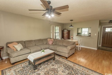 Step into the serene oasis of Myrtle Beach Golf & Yacht, a on Heron Point Golf Club in South Carolina - for sale on GolfHomes.com, golf home, golf lot