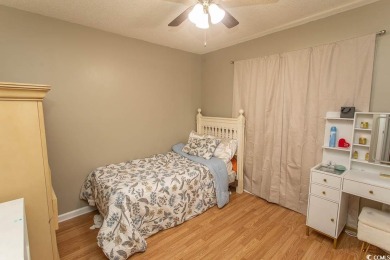 Step into the serene oasis of Myrtle Beach Golf & Yacht, a on Heron Point Golf Club in South Carolina - for sale on GolfHomes.com, golf home, golf lot