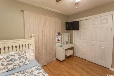 Step into the serene oasis of Myrtle Beach Golf & Yacht, a on Heron Point Golf Club in South Carolina - for sale on GolfHomes.com, golf home, golf lot