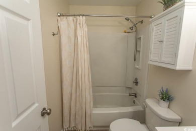 Step into the serene oasis of Myrtle Beach Golf & Yacht, a on Heron Point Golf Club in South Carolina - for sale on GolfHomes.com, golf home, golf lot