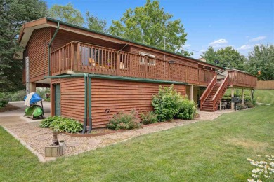 One of a kind lake area home with walls of windows!   This is on Lake McBride Golf Course in Iowa - for sale on GolfHomes.com, golf home, golf lot