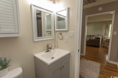 Step into the serene oasis of Myrtle Beach Golf & Yacht, a on Heron Point Golf Club in South Carolina - for sale on GolfHomes.com, golf home, golf lot