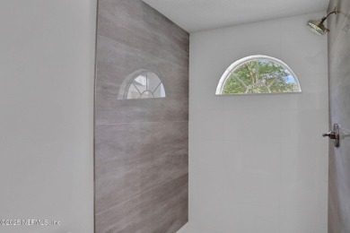 Beautifully renovated 3BR/2BA home with 2-car garage on a shaded on Julington Creek Golf Club in Florida - for sale on GolfHomes.com, golf home, golf lot
