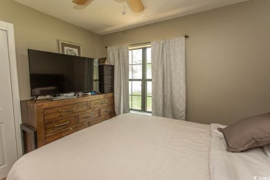 Step into the serene oasis of Myrtle Beach Golf & Yacht, a on Heron Point Golf Club in South Carolina - for sale on GolfHomes.com, golf home, golf lot