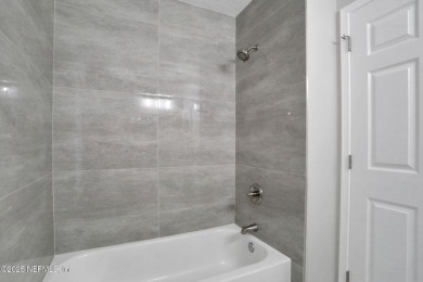 Beautifully renovated 3BR/2BA home with 2-car garage on a shaded on Julington Creek Golf Club in Florida - for sale on GolfHomes.com, golf home, golf lot