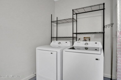 Beautifully renovated 3BR/2BA home with 2-car garage on a shaded on Julington Creek Golf Club in Florida - for sale on GolfHomes.com, golf home, golf lot