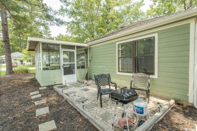 Step into the serene oasis of Myrtle Beach Golf & Yacht, a on Heron Point Golf Club in South Carolina - for sale on GolfHomes.com, golf home, golf lot