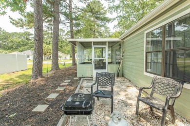 Step into the serene oasis of Myrtle Beach Golf & Yacht, a on Heron Point Golf Club in South Carolina - for sale on GolfHomes.com, golf home, golf lot