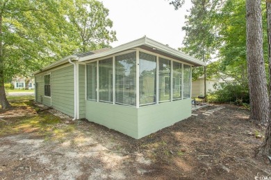 Step into the serene oasis of Myrtle Beach Golf & Yacht, a on Heron Point Golf Club in South Carolina - for sale on GolfHomes.com, golf home, golf lot