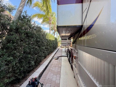 YOUR TROPICAL OASIS AWAITS! Ideally situated near the north on St. Lucie Trail Golf Club in Florida - for sale on GolfHomes.com, golf home, golf lot