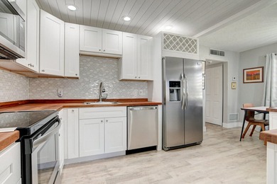 Enjoy the best of 55+ living in this renovated, move-in-ready on Kings Point Golf -Flanders Way in Florida - for sale on GolfHomes.com, golf home, golf lot