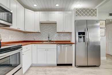 Enjoy the best of 55+ living in this renovated, move-in-ready on Kings Point Golf -Flanders Way in Florida - for sale on GolfHomes.com, golf home, golf lot