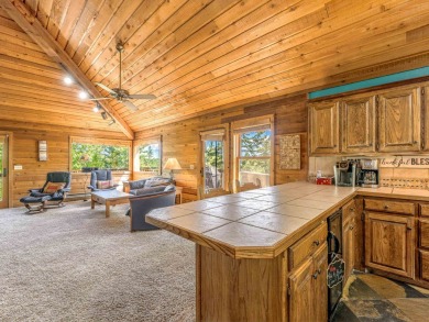 Tucked away amid whispering pines and just a short walk to the on Angel Fire Resort Country Club in New Mexico - for sale on GolfHomes.com, golf home, golf lot