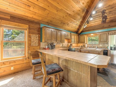 Tucked away amid whispering pines and just a short walk to the on Angel Fire Resort Country Club in New Mexico - for sale on GolfHomes.com, golf home, golf lot