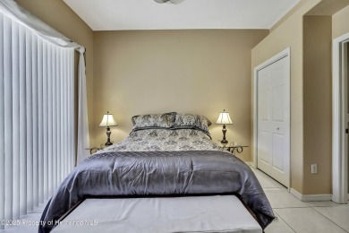 Looking for a place with a tropical vibe? Then come and on Glen Lakes Country Club in Florida - for sale on GolfHomes.com, golf home, golf lot