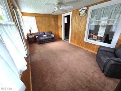 Welcome to this quaint, cape cod--nestled in a private Lake on The Harbor Golf Club in Ohio - for sale on GolfHomes.com, golf home, golf lot