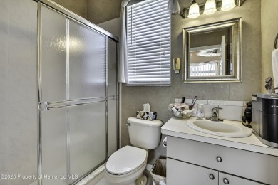 Looking for a place with a tropical vibe? Then come and on Glen Lakes Country Club in Florida - for sale on GolfHomes.com, golf home, golf lot
