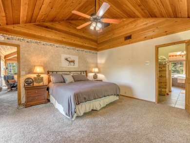Tucked away amid whispering pines and just a short walk to the on Angel Fire Resort Country Club in New Mexico - for sale on GolfHomes.com, golf home, golf lot