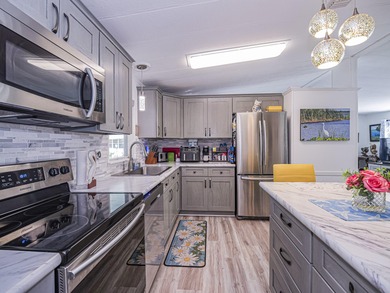 No age restriction in Barefoot Bay! Enjoy this spacious 2/2 with on Barefoot Bay Golf Course in Florida - for sale on GolfHomes.com, golf home, golf lot