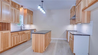 This single-level 3 bed, 2 bath home is perfectly placed right on Eagle Ridge Golf Course in Minnesota - for sale on GolfHomes.com, golf home, golf lot