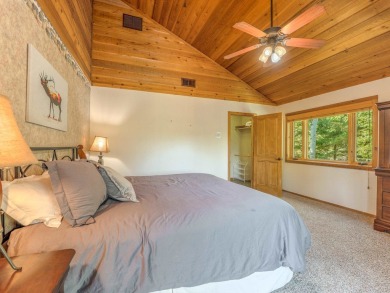 Tucked away amid whispering pines and just a short walk to the on Angel Fire Resort Country Club in New Mexico - for sale on GolfHomes.com, golf home, golf lot