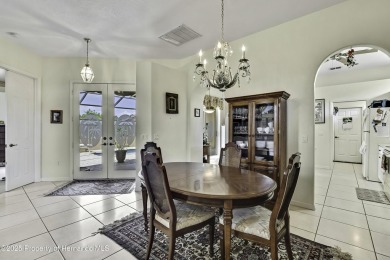 Looking for a place with a tropical vibe? Then come and on Glen Lakes Country Club in Florida - for sale on GolfHomes.com, golf home, golf lot