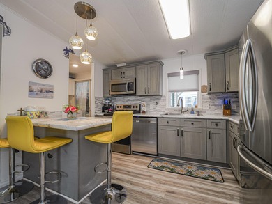 No age restriction in Barefoot Bay! Enjoy this spacious 2/2 with on Barefoot Bay Golf Course in Florida - for sale on GolfHomes.com, golf home, golf lot