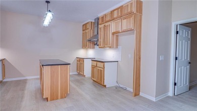 This single-level 3 bed, 2 bath home is perfectly placed right on Eagle Ridge Golf Course in Minnesota - for sale on GolfHomes.com, golf home, golf lot
