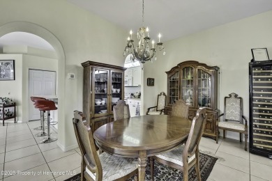 Looking for a place with a tropical vibe? Then come and on Glen Lakes Country Club in Florida - for sale on GolfHomes.com, golf home, golf lot