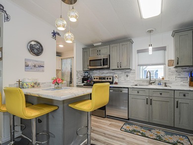 No age restriction in Barefoot Bay! Enjoy this spacious 2/2 with on Barefoot Bay Golf Course in Florida - for sale on GolfHomes.com, golf home, golf lot