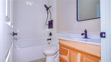 This single-level 3 bed, 2 bath home is perfectly placed right on Eagle Ridge Golf Course in Minnesota - for sale on GolfHomes.com, golf home, golf lot