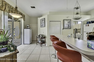 Looking for a place with a tropical vibe? Then come and on Glen Lakes Country Club in Florida - for sale on GolfHomes.com, golf home, golf lot
