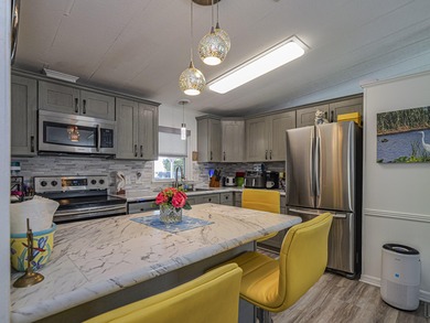No age restriction in Barefoot Bay! Enjoy this spacious 2/2 with on Barefoot Bay Golf Course in Florida - for sale on GolfHomes.com, golf home, golf lot
