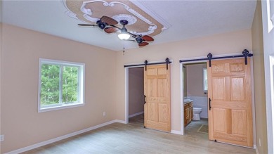This single-level 3 bed, 2 bath home is perfectly placed right on Eagle Ridge Golf Course in Minnesota - for sale on GolfHomes.com, golf home, golf lot