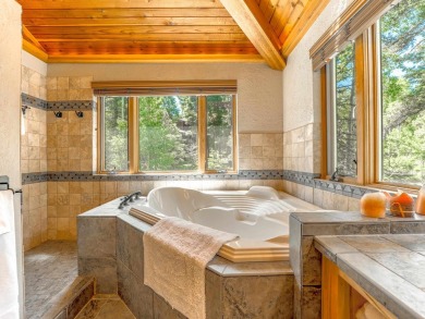 Tucked away amid whispering pines and just a short walk to the on Angel Fire Resort Country Club in New Mexico - for sale on GolfHomes.com, golf home, golf lot