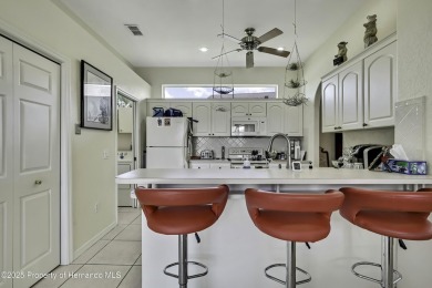 Looking for a place with a tropical vibe? Then come and on Glen Lakes Country Club in Florida - for sale on GolfHomes.com, golf home, golf lot