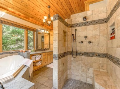 Tucked away amid whispering pines and just a short walk to the on Angel Fire Resort Country Club in New Mexico - for sale on GolfHomes.com, golf home, golf lot