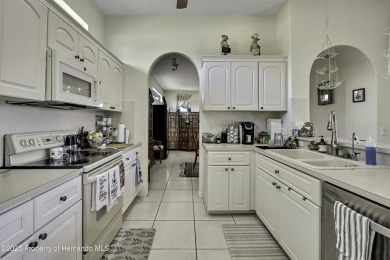 Looking for a place with a tropical vibe? Then come and on Glen Lakes Country Club in Florida - for sale on GolfHomes.com, golf home, golf lot