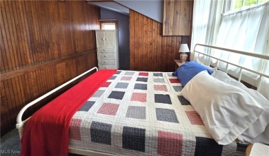Welcome to this quaint, cape cod--nestled in a private Lake on The Harbor Golf Club in Ohio - for sale on GolfHomes.com, golf home, golf lot