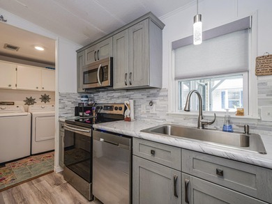 No age restriction in Barefoot Bay! Enjoy this spacious 2/2 with on Barefoot Bay Golf Course in Florida - for sale on GolfHomes.com, golf home, golf lot