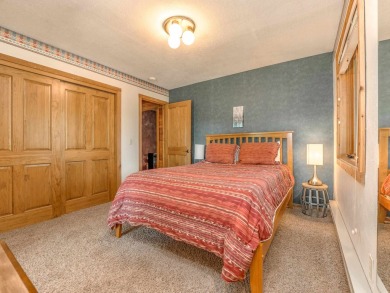 Tucked away amid whispering pines and just a short walk to the on Angel Fire Resort Country Club in New Mexico - for sale on GolfHomes.com, golf home, golf lot