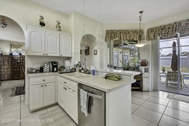 Looking for a place with a tropical vibe? Then come and on Glen Lakes Country Club in Florida - for sale on GolfHomes.com, golf home, golf lot