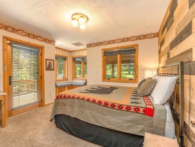 Tucked away amid whispering pines and just a short walk to the on Angel Fire Resort Country Club in New Mexico - for sale on GolfHomes.com, golf home, golf lot