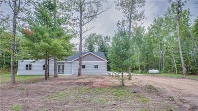 This single-level 3 bed, 2 bath home is perfectly placed right on Eagle Ridge Golf Course in Minnesota - for sale on GolfHomes.com, golf home, golf lot