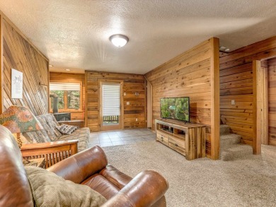 Tucked away amid whispering pines and just a short walk to the on Angel Fire Resort Country Club in New Mexico - for sale on GolfHomes.com, golf home, golf lot