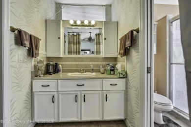 Looking for a place with a tropical vibe? Then come and on Glen Lakes Country Club in Florida - for sale on GolfHomes.com, golf home, golf lot