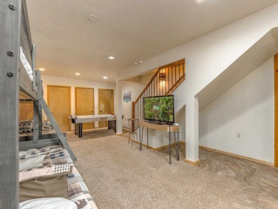 Tucked away amid whispering pines and just a short walk to the on Angel Fire Resort Country Club in New Mexico - for sale on GolfHomes.com, golf home, golf lot