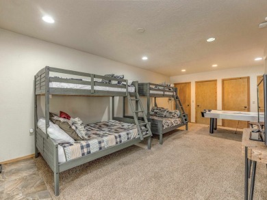 Tucked away amid whispering pines and just a short walk to the on Angel Fire Resort Country Club in New Mexico - for sale on GolfHomes.com, golf home, golf lot