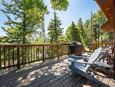 Tucked away amid whispering pines and just a short walk to the on Angel Fire Resort Country Club in New Mexico - for sale on GolfHomes.com, golf home, golf lot